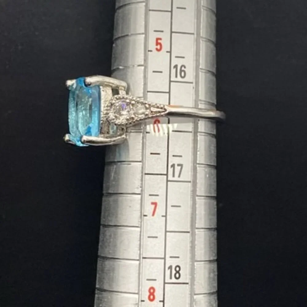Emerald Cut Lab Blue Topaz Ring CZ Accents Size 5.75 3.4 grams Silver Plated - Picture 8 of 8